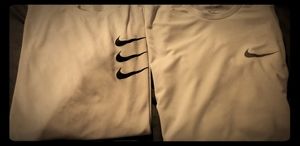 2 nike running shirts